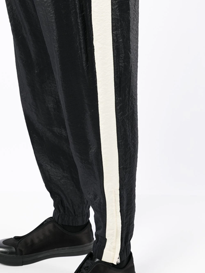 Shop Saint Laurent Side-stripe Track Pants In Black