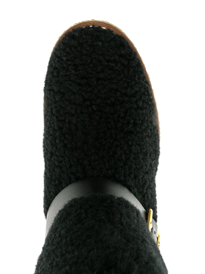 Shop Tod's Platform Shearling Boots In Black