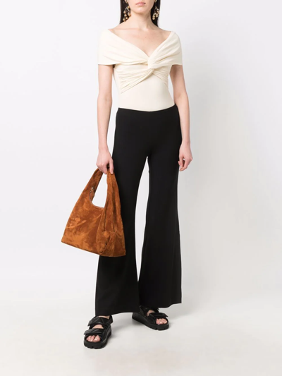 Rodebjer Flared Mid-rise Trousers In Black