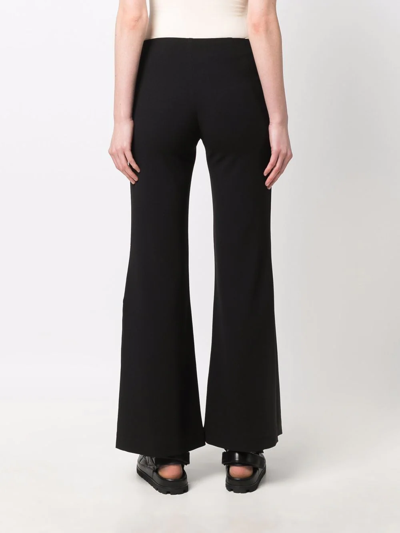 Rodebjer Flared Mid-rise Trousers In Black