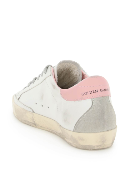 Shop Golden Goose Super-star Sneakers In White Ice Light Pink (white)
