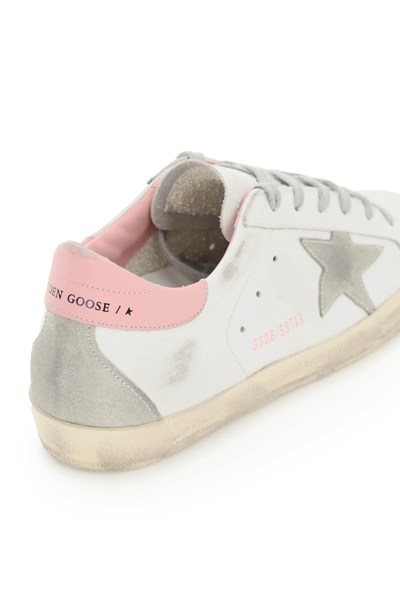Shop Golden Goose Super-star Sneakers In White Ice Light Pink (white)