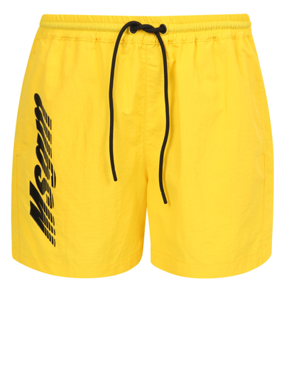 Shop Msgm Logo-print Swim Shorts In Yellow