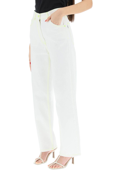 Shop Msgm Boy Jeans With Neon Stitching In Off White (white)