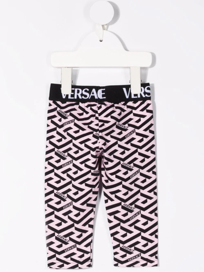 Versace All-over Logo Print Leggings In Pink