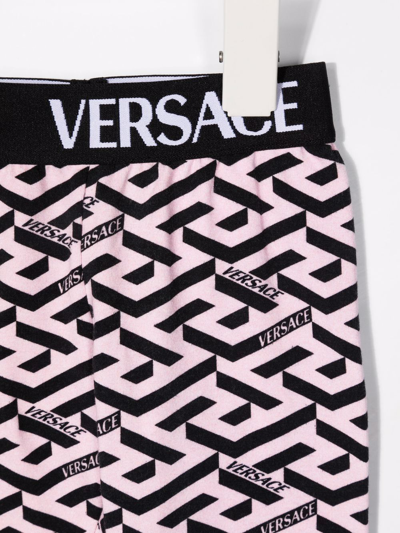 Shop Versace All-over Logo Print Leggings In Pink