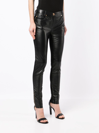 Shop Versace Panelled Skinny Trousers In Black