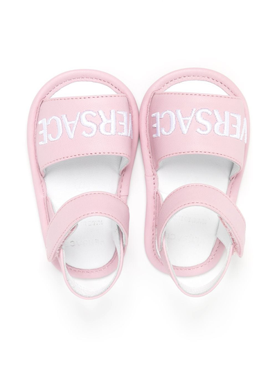 Shop Versace Logo Print Sandals In Pink