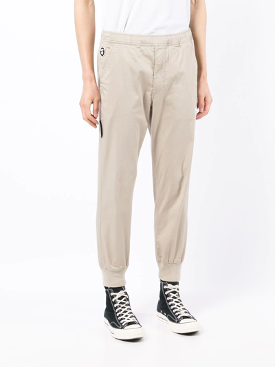 Shop Aape By A Bathing Ape Logo-print Cotton Track Pants In Brown