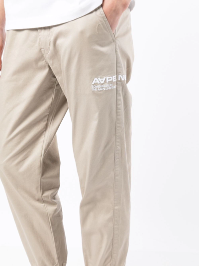 Shop Aape By A Bathing Ape Logo-print Cotton Track Pants In Brown