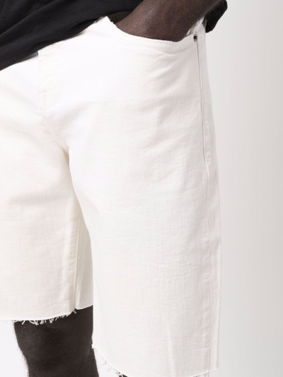 Shop Frame Frayed Denim Shorts In White