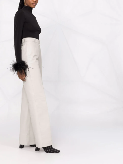 Atu Body Couture Feather-cuff High-neck Top In Black