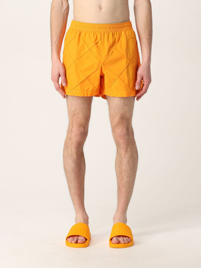 Shop Bottega Veneta Intreccio Pattern Swim Shorts In Orange