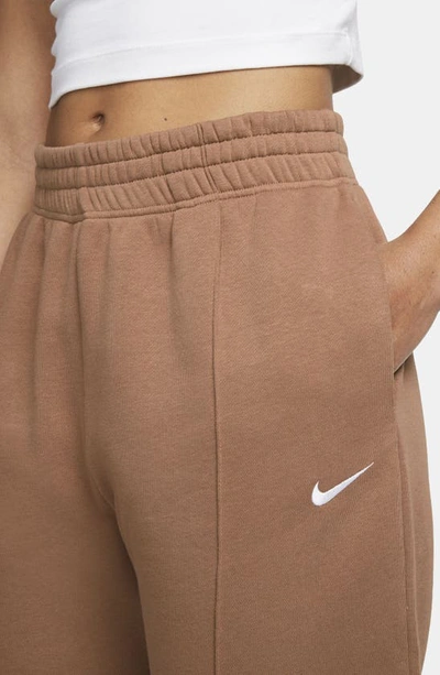 Nike Sportswear Essential Fleece Pants In Mineral Clay/ White | ModeSens