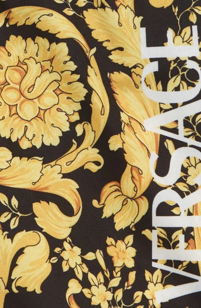 Shop Versace Barocco Print Logo Swim Trunks In Nero Oro