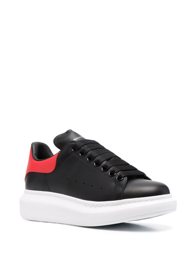 Shop Alexander Mcqueen Oversize Lace-up Sneakers In Black