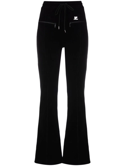 Shop Courrèges Embroidered-logo Flared Trousers In Black