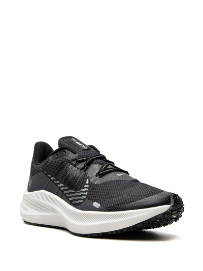 Shop Nike Winflo 7 Shield Sneakers In Black
