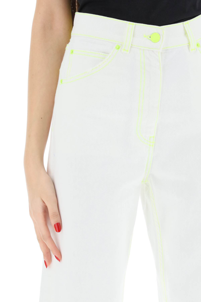 Shop Msgm Boy Jeans With Neon Stitching In White,yellow