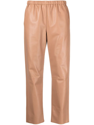 Shop Drome Tapered-leg Leather Trousers In Nude