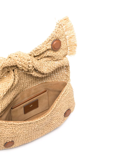Shop Anya Hindmarch Bow-detail Raffia Clutch Bag In Nude