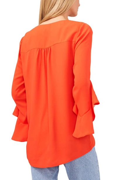 Shop Vince Camuto Flutter Sleeve Tunic In Blaze Orange