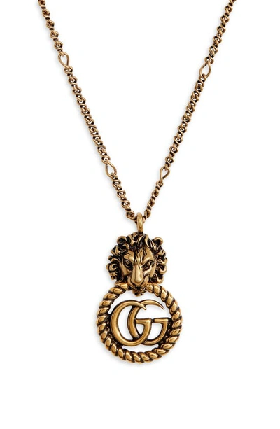 Shop Gucci Lion Head Double-g Pendant Necklace In Gold