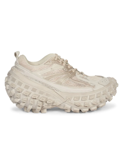 Shop Balenciaga Defender Chunky Sneakers In Beige