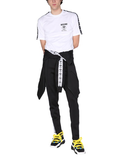 Shop Moschino Jogging Pants In Nero