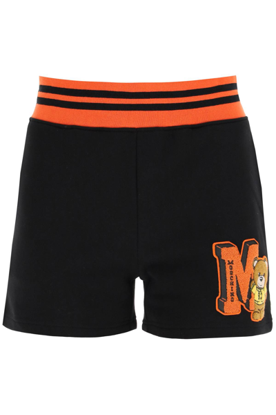 Shop Moschino Varsity Teddy Bear Sweatshorts In Black,orange