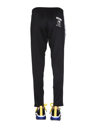 Shop Moschino Jogging Pants In Black