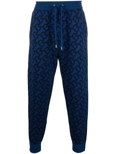 Shop Burberry Monogram-pattern Track Pants In Blue