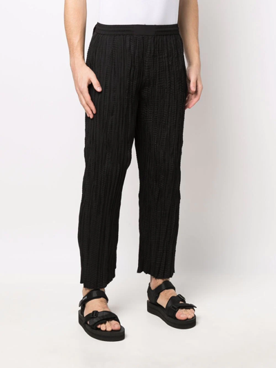 Shop Mcq By Alexander Mcqueen Micro-pleated Design Trousers In Black