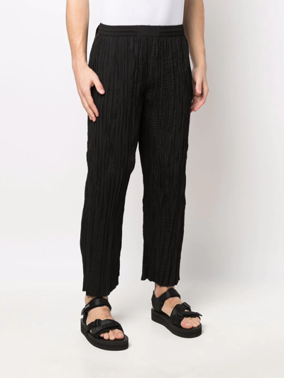 Mcq By Alexander Mcqueen Micro-pleated Design Trousers In Black