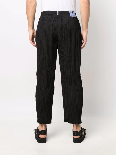 Shop Mcq By Alexander Mcqueen Micro-pleated Design Trousers In Black