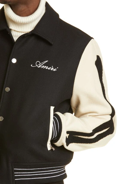 Shop Amiri Bones Wool Blend Varsity Jacket In Black / Alabaster