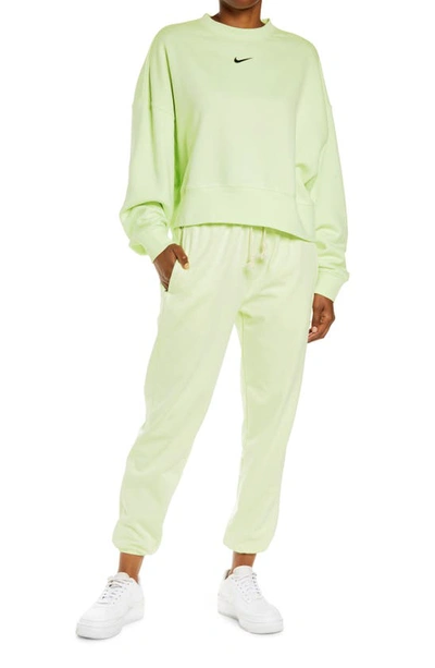 Shop Nike Sportswear Essential Oversize Sweatshirt In Lime Ice/ Black