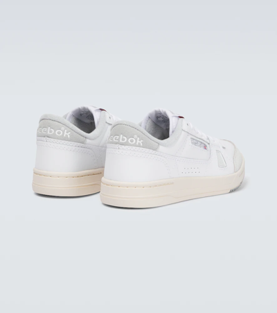 Shop Reebok Lt Court Leather Sneakers In Ftwwht/pugry3/alabas