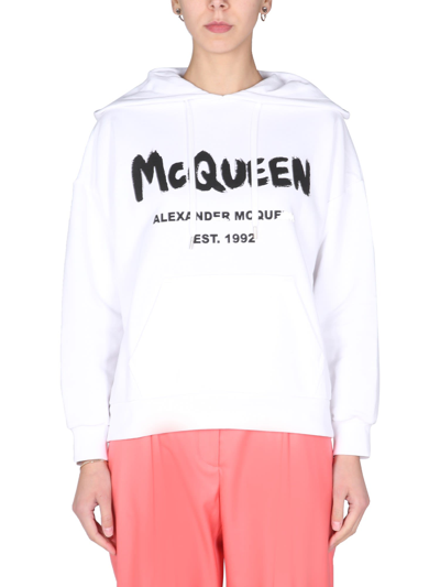 Shop Alexander Mcqueen Sweatshirt With Graffito Logo Print In Bianco