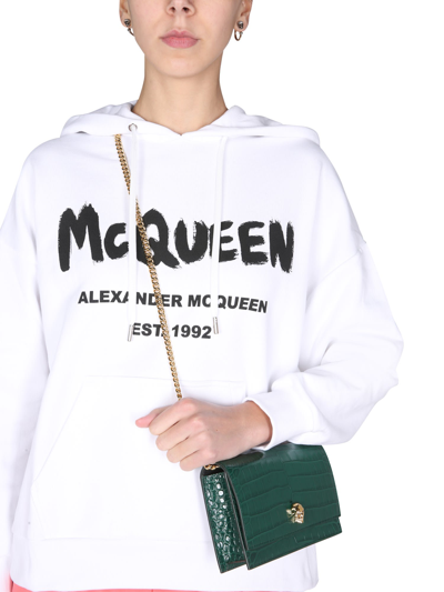 Shop Alexander Mcqueen Sweatshirt With Graffito Logo Print In Bianco