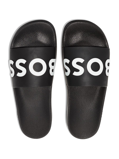 Shop Hugo Boss Logo Print Slides In Schwarz