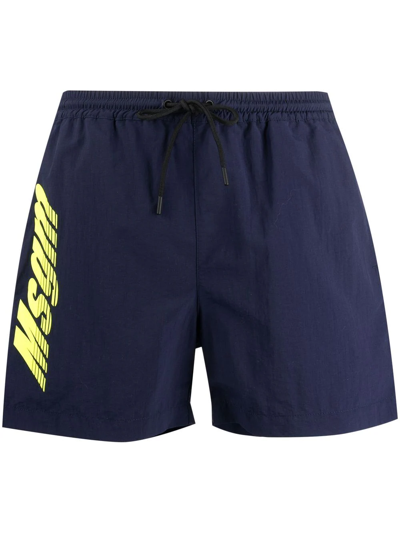 Shop Msgm Logo-print Swim Shorts In Blue