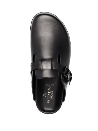 Shop Valentino Vlogo Leather Slippers In Schwarz