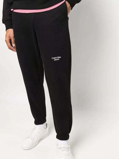 Shop Calvin Klein Jeans Est.1978 Logo-print Cotton Track Pants In Black