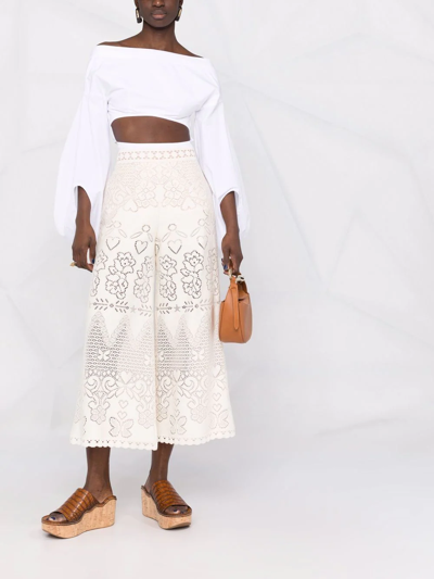 Shop Valentino Wide-leg Lace Trousers In Neutrals
