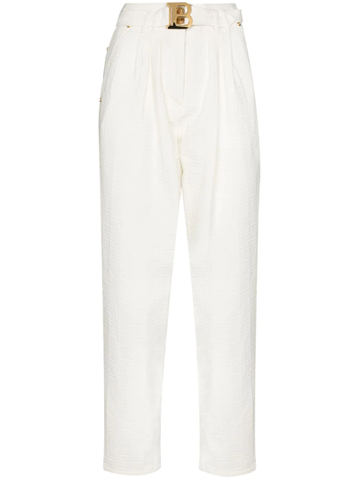 Shop Balmain Monogram-print Logo-buckle High-waisted Jeans In Weiss