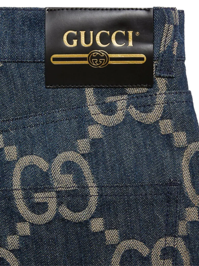 Shop Gucci Jumbo Gg Denim Trousers In Blau