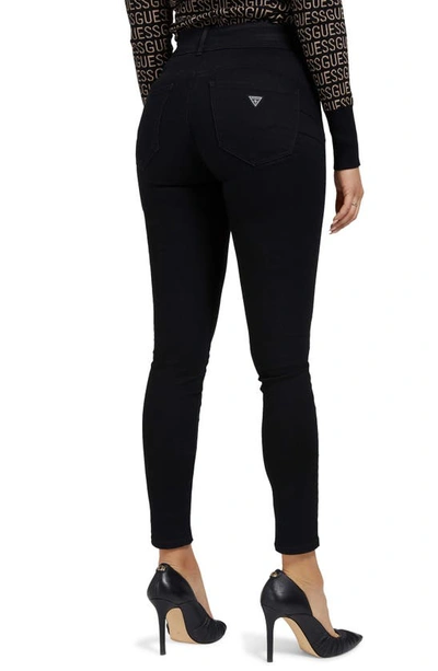 Shop Guess Shape Up Mid Rise Stretch Skinny Jeans In Carrie Black
