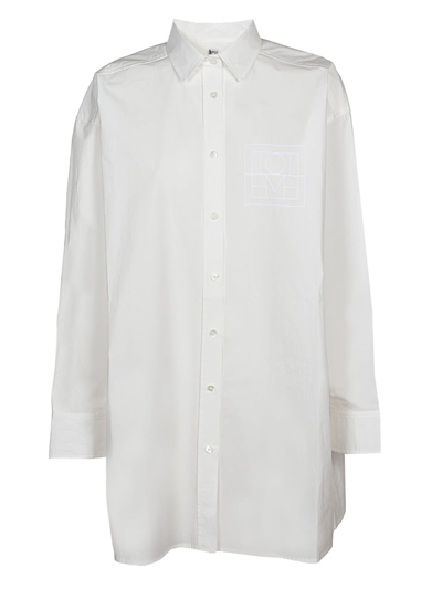Shop Totême Long Monogram Cotton Shirt In 100
