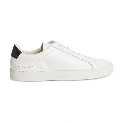Shop Common Projects Retro Low Sneakers In White Black